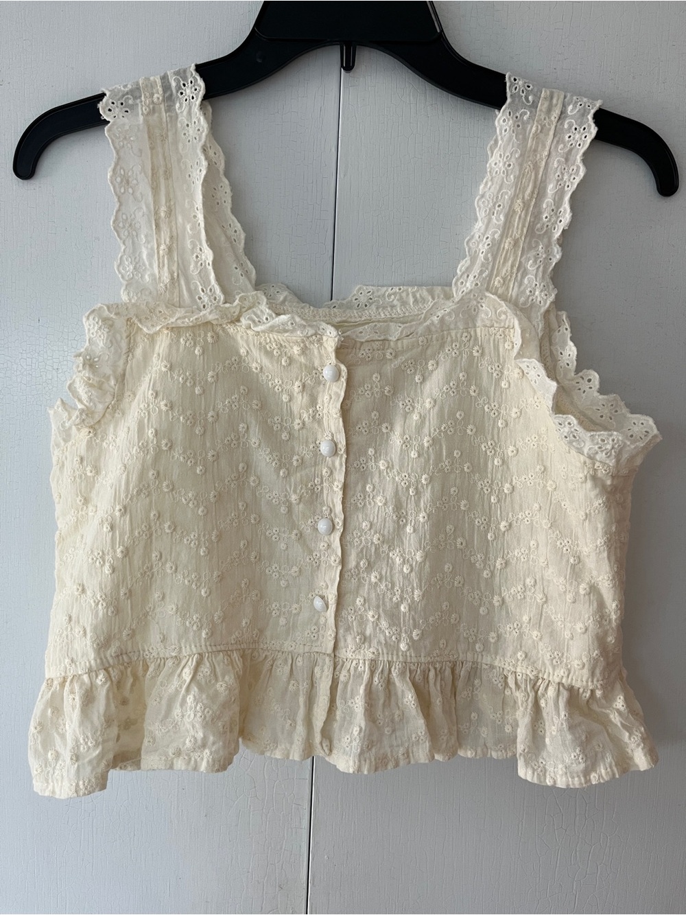 Cream Eyelet Button-Front Ruffle Crop Top